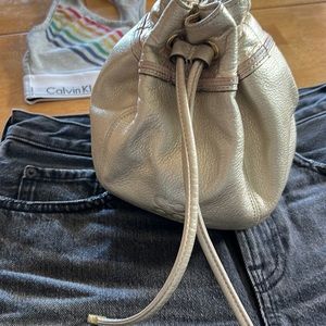 🔥 Coach Gold leather drawstring mini bucket bag